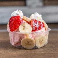 Strawberry Banana Surprise · Sliced Bananas topped with Strawberry Ice Cream, a fresh La Lechera Drizzle, freshly chopped...