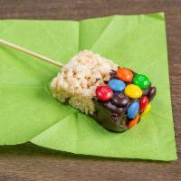 Rice Crispy Treat on a stick · Rice Crispy Treat dipped in chocolate and decorated with M & Ms