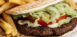 Beef Gyro Sandwich  · Served in a wrapped pita with tomato, onions, lettuce and tzatziki sauce.