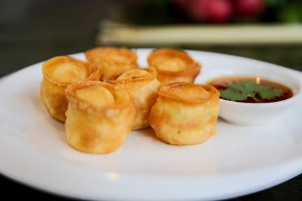 Crab Rangoon** best seller** · Fried wonton stuffed with crabmeat, cream cheese with sweet chili sauce.