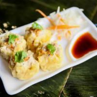 Chicken Dumpling · Fried or steamed. Minced chicken & shrimp, mushroom with soy sauce.