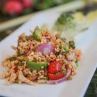 Larb Salad  · Minced chicken or  pork, Onion, scallion, mint, toasted rice with chili lime dressing. Mild ...