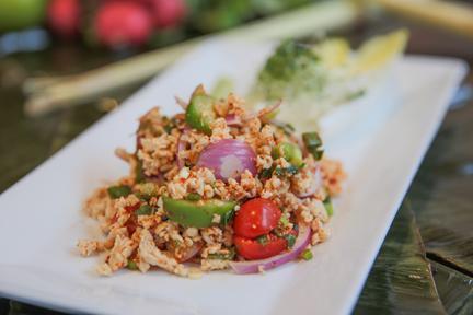 Larb Salad  · Minced chicken or  pork, Onion, scallion, mint, toasted rice with chili lime dressing. Mild spicy.