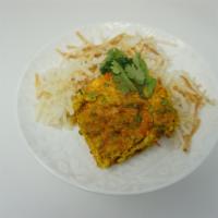 India Spiced Scrambled Eggs · Cage-free scrambled eggs cooked with vegetables and Indian spices. Served with baked hashbro...