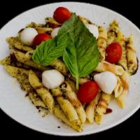 CAPRESE PASTA SALAD · Fresh mozzarella balls, grape tomatoes and fresh basil tossed with penne pasta and finished ...