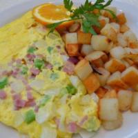 B22. Western Omelette Plate · Turkey ham, onions and peppers with home fries and toast.