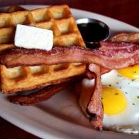 B28. Waffles Plate · With bacon or sausage.