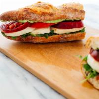 Balsamic Glazed Caprese Sandwich · This Balsamic Glazed Caprese Sandwich is packed with the flavor of fresh tomatoes, arugula a...