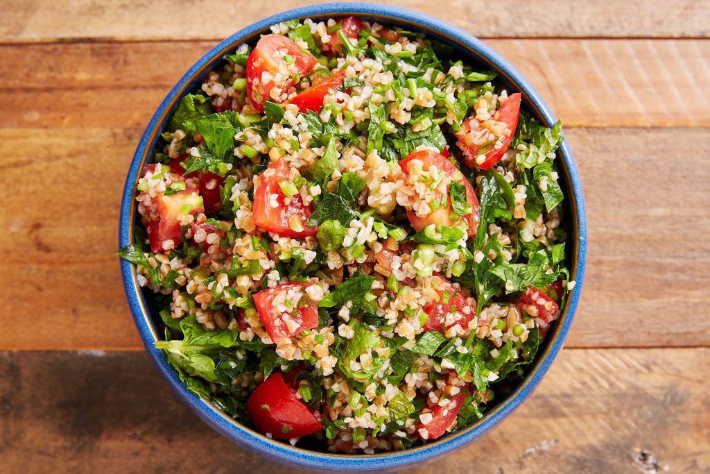 Fresh Handmade Tabouli Salad  · This delicious and nutritious Middle-Eastern vegetarian salad is made up with fresh-chopped parsley and seasoned with olive oil, lemon juice, and salt.