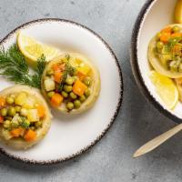 Artichoke Caps Stuffed with Peas, Carrots & Cheese. · Goat Cheese Stuffed Artichoke Bottoms are impressive and so delicious!  Soon to become your ...