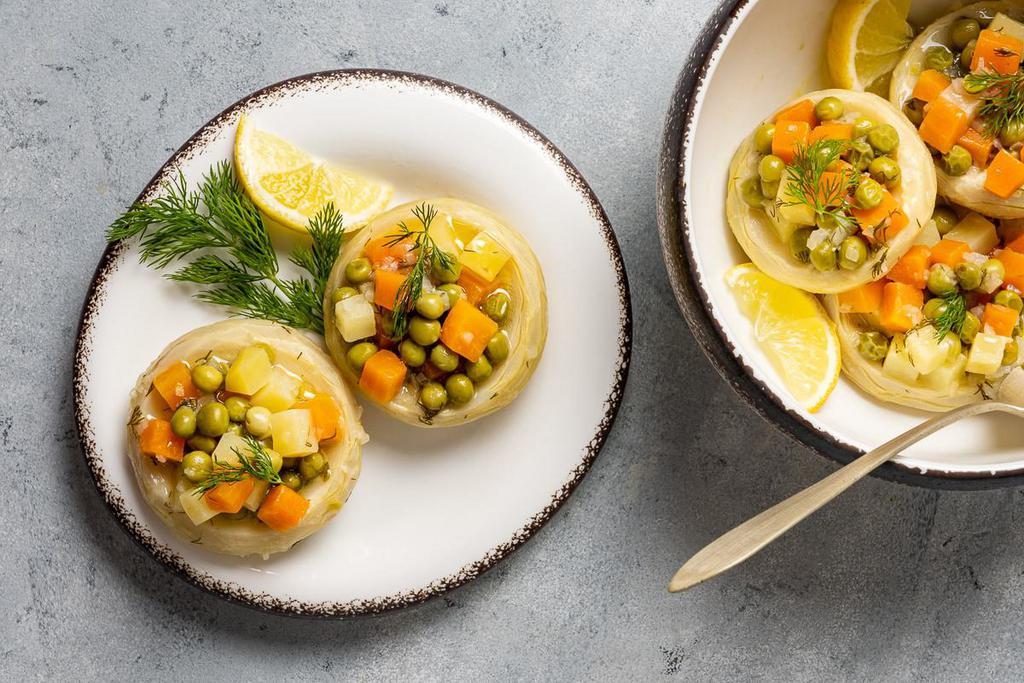 Artichoke Caps Stuffed with Peas, Carrots & Cheese. · Goat Cheese Stuffed Artichoke Bottoms are impressive and so delicious!  Soon to become your favorite hot appetizer!
