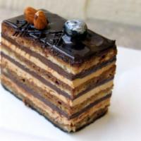 Fresh Opera Cake Slice  · An amazing French cake that uses one of the most loved blends of flavors: chocolate and coff...