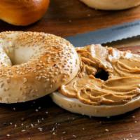 Bagel and Peanut Butter · Get yourself a heavenly toasted and melted peanut butter bagel treatment this morning...