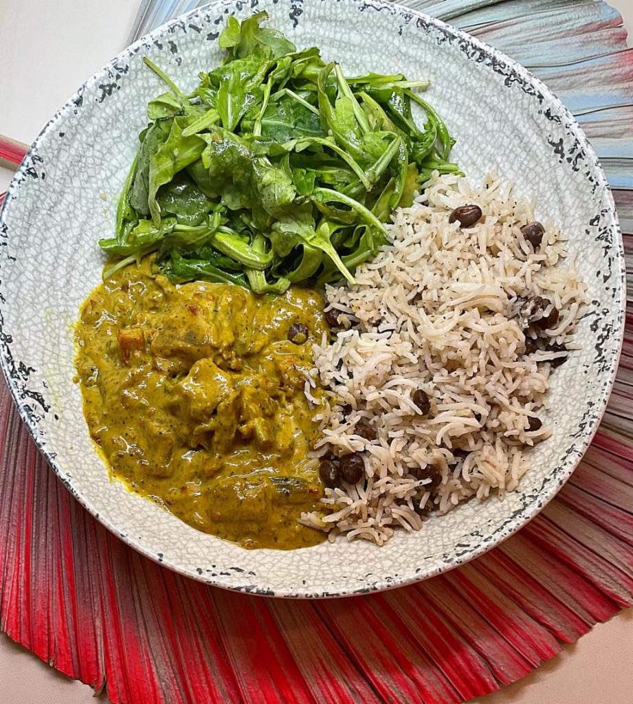 Curried Vegetables Rice Bowl · Carrots, Celery, Potatoes, Vegetarian Curry, Coconut Rice & Peas, Arugula Salad