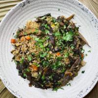 Mushroom Fried Rice Bowl · Coconut Rice, Pigeon Peas, Carrots, Onions, Egg, Mojo Marinated King Oyster Mushrooms