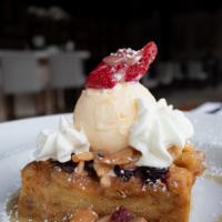 Apple Bread Pudding · cranberries, vanilla ice cream, gran marnier sauce