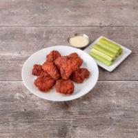 Boneless Wings · Fried and tossed in our famous sauce, served with blue cheese and celery sticks.