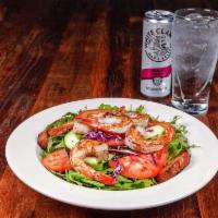 Grilled Shrimp House Salad · 5 jumbo shrimp, char-grilled or Cajun style over house salad with homemade seasoned croutons.