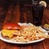 Cheeseburger · 10 oz. of 100% prime beef served on a toasted brioche roll with fries, lettuce, tomato and p...