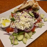 Horiatiki Salad  · The traditional salad with fresh tomatoes, cucumbers, onions, green peppers, feta, Kalamata ...