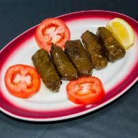 Stuffed Grape Leaves · Grape leaves stuffed with the chef's special blend of rice, herbs and spices.