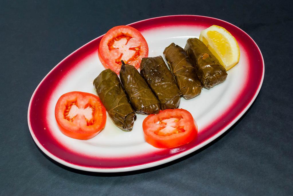 Stuffed Grape Leaves · Grape leaves stuffed with the chef's special blend of rice, herbs and spices.