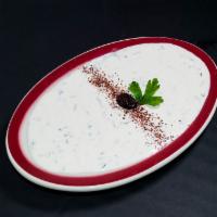 Tarator · A very special mixture of tahini, yogurt, sour cream, fresh garlic and parsley.