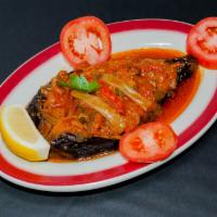 Stuffed Eggplant · Pan-fried fancy eggplants stuffed with delicious tomato and onion sauce topped with sliced g...