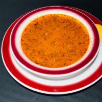 Red Lentil Soup · Pureed red lentil prepared with a blend of herbs.