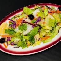 Green Salad · Largely chopped romaine, red leaf and green leaf lettuce, grated red cabbage and carrots dre...