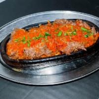 Doner Sautee · Doner kebab sauteed with fresh tomatoes, onions and a blend of spices.