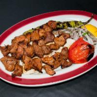 Diced Shish Kebab · Small cubes of baby lamb marinated in the chef's special sauce and grilled on skewers with o...