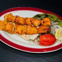 Chicken Kebab · Tender chunks of chicken marinated in the chef's special sauce with roasted peppers and toma...
