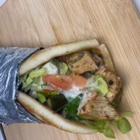 Detroiter Sandwich · Chicken shawarma. Grilled marinated chicken, tomato, lettuce pickles, mayo garlic spread wra...