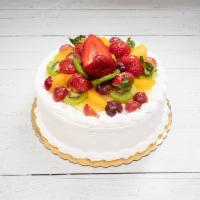 California Cake · Vanilla cake filled with Strawberry, vanilla and a layer of pastry dough. Topped with fresh ...