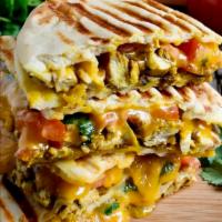10. Chicken Club Panini · Grilled chicken, smoked bacon, Swiss cheese, plum tomatoes and ranch dressing. On European f...