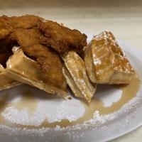Chicken & Waffle · Crispy chicken tenders on top of a delicious crispy waffle topped with sugar powder and mapl...
