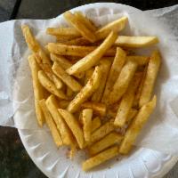 Seasoned Fries · Golden seasoned french fries.