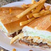 The Fat King Sandwiche · This is the king of fat sandwiches that features a sizzling burger patty grilled with melted...