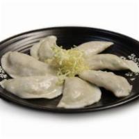 6 Steamed Dumplings · 6 steamed dumplings. (Veggie or Pork or Chicken).