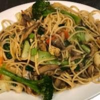 Spaghetti Primavera · Spaghetti sauteed with olive oil, onions, garlic, carrots, and seasonal vegetables. Served w...