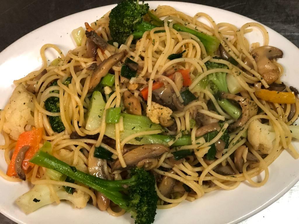 Spaghetti Primavera · Spaghetti sauteed with olive oil, onions, garlic, carrots, and seasonal vegetables. Served with side salad and bread.