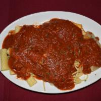 Combination Plate · Spaghetti, rigatoni, lasagna, ravioli and manicotti with meat sauce.