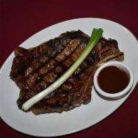 US Choice Ribeye · Served with side spaghetti with meat sauce, side salad and bread.