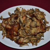 Como's Baked Chicken · Half chicken baked in our oven with mushrooms and garlic till crispy and tender. Served with...