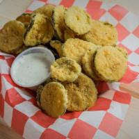 Homemade Fried Dill Pickles · Hand-battered fried dill pickle slices. Served with a side of ranch dressing.