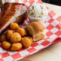 Smoked Turkey Leg Combo Plate · Served with your choice of 2 sides and a roll.