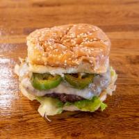 Spanish Beef BurgerIM · 1/3 lb. patty.  Recommended style: Caliente (Habanero Mayo, Lettuce, Pepper Jack Cheese, Jal...