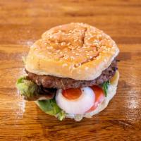 Lamb BurgerIM · 1/3 lb. patty. Recommended style: Greek (Mixed Greens, Tomatoes, Onions, Tzaziki Sauce).