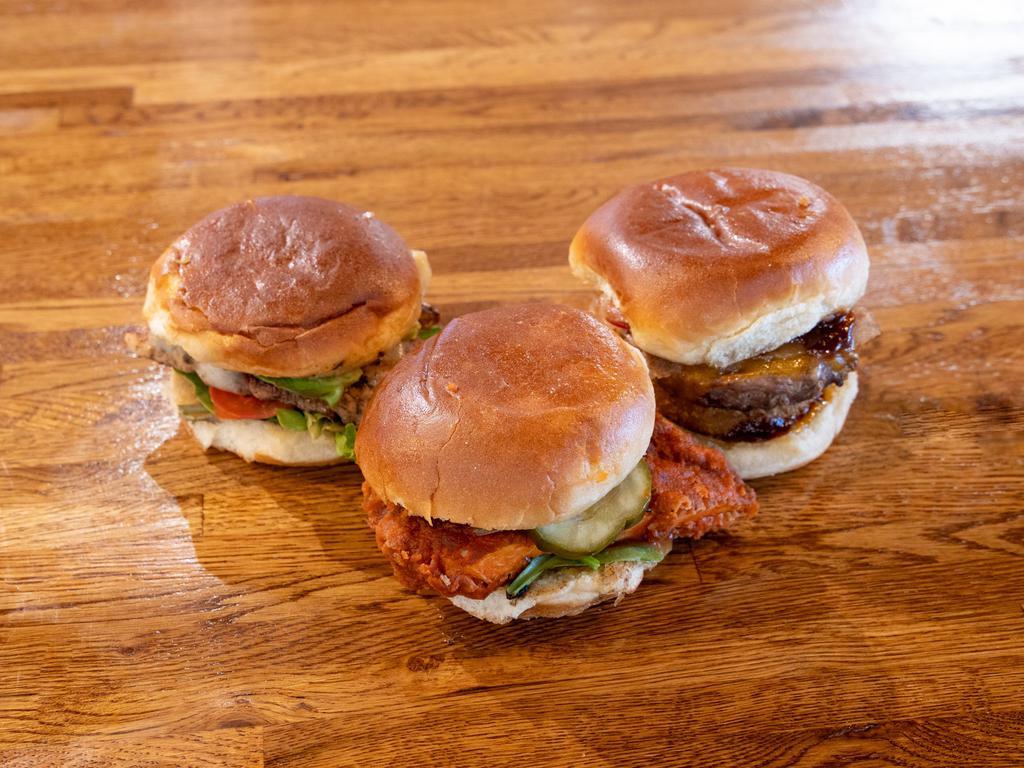 Trio BurgerIM · Choose three 3 oz. proteins and mix and match your toppings.